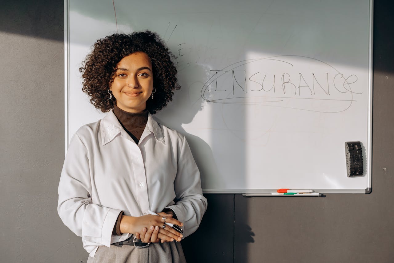 Woman Standing Near a White Board